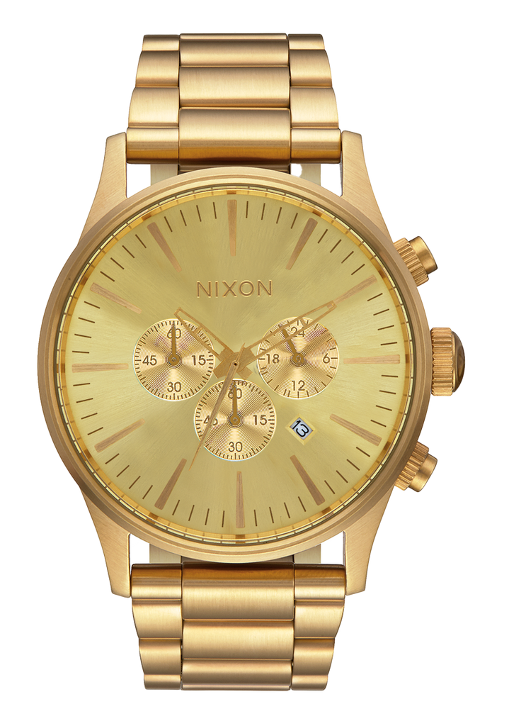 White and clearance gold nixon watch