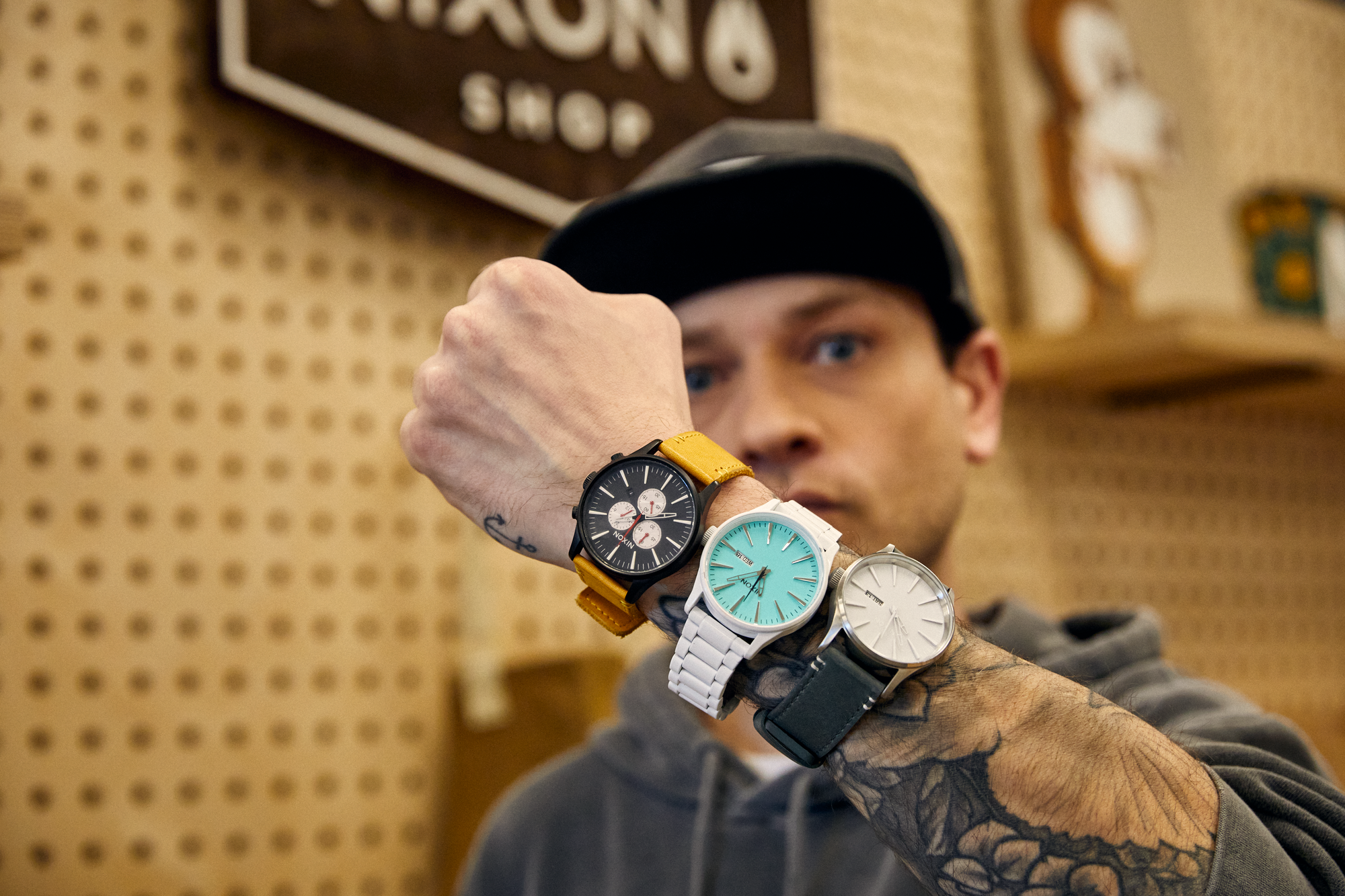 Nixon employee Robert Burton wearing 3 of his favorite Nixon Sentry watches.