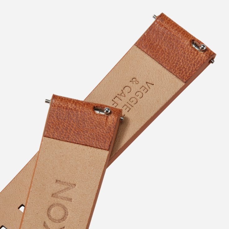 A brown quick release watch band from Nixon.